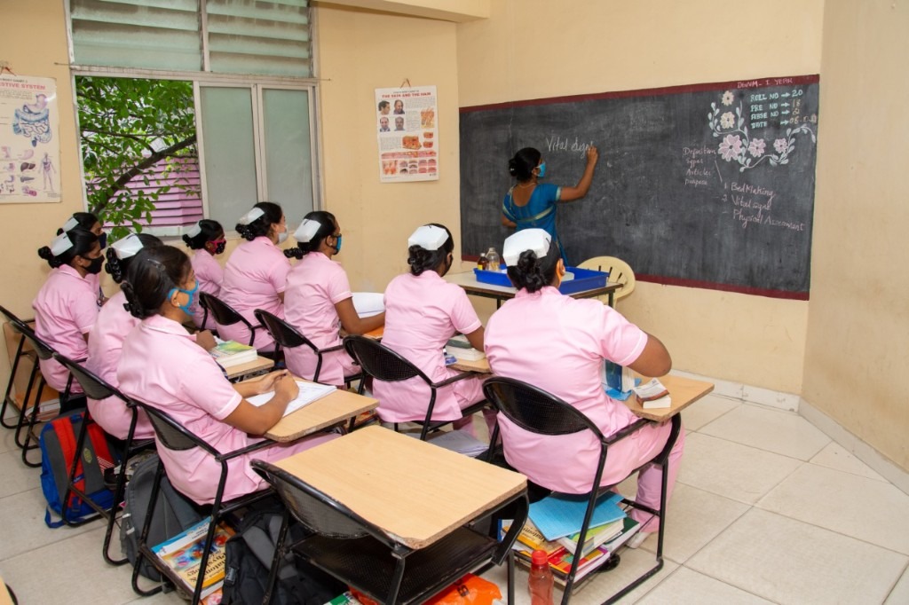 SAH nursing students with instructor during a vital signs class